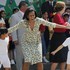 Четыре платья за два дня: Мишель Обама в Мексике. Фото: © REUTERS/Eliana Aponte .